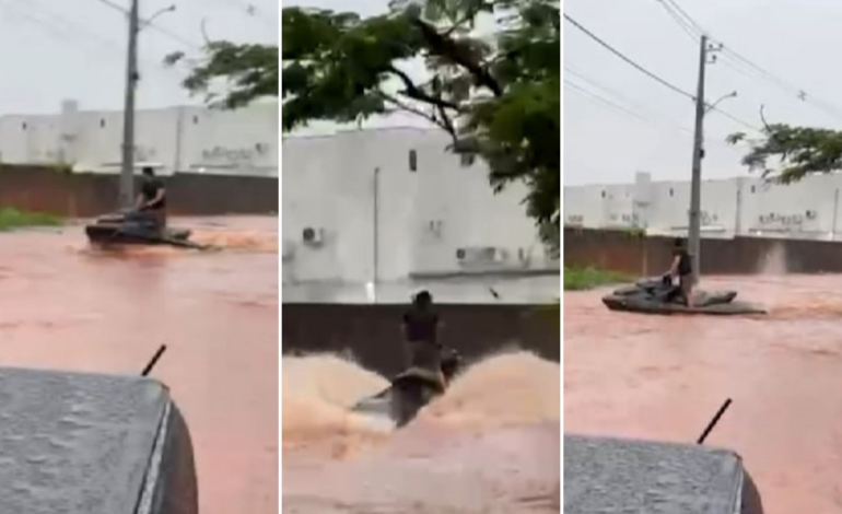 morador-usa-moto-aquatica-em-rua-apos-chuva-causar-alagamentos-em-araguaina;-video